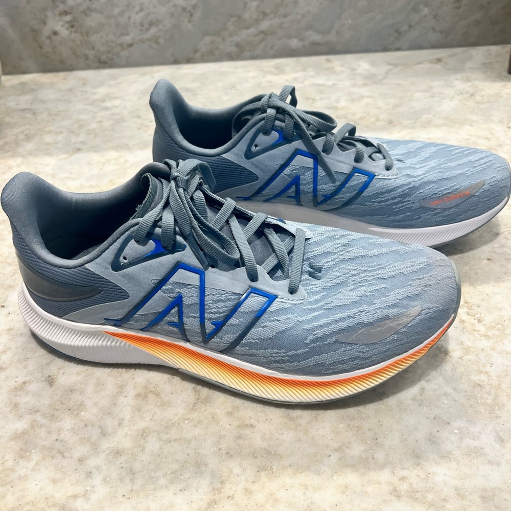 New Balance Gray and Blue Athletic Shoes with Mesh Upper